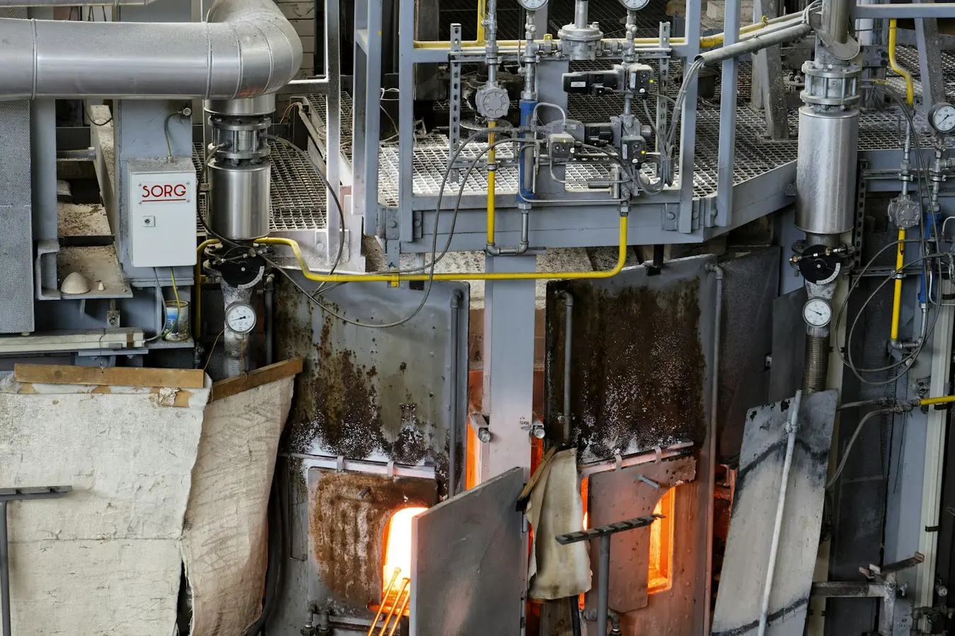 Industrial process equipment, gauges and controls on a production floor